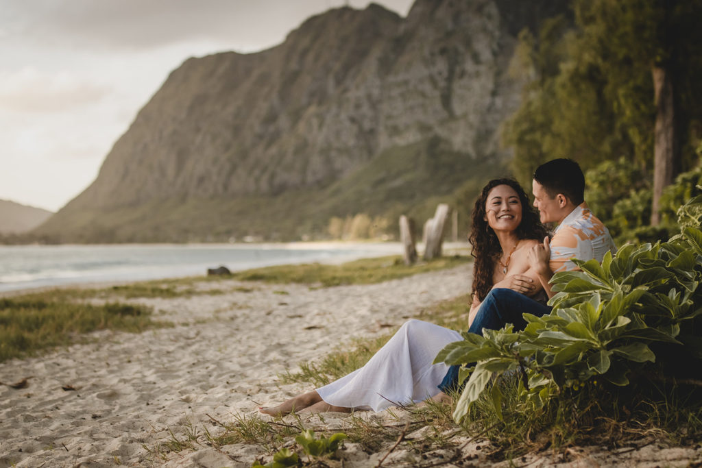Couple Sitting on a Hawaiian beach.