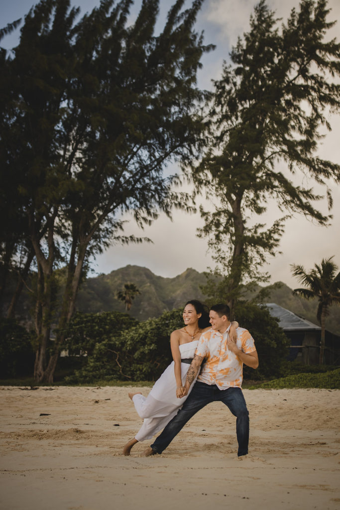 Couple dancing on a tropical beach.