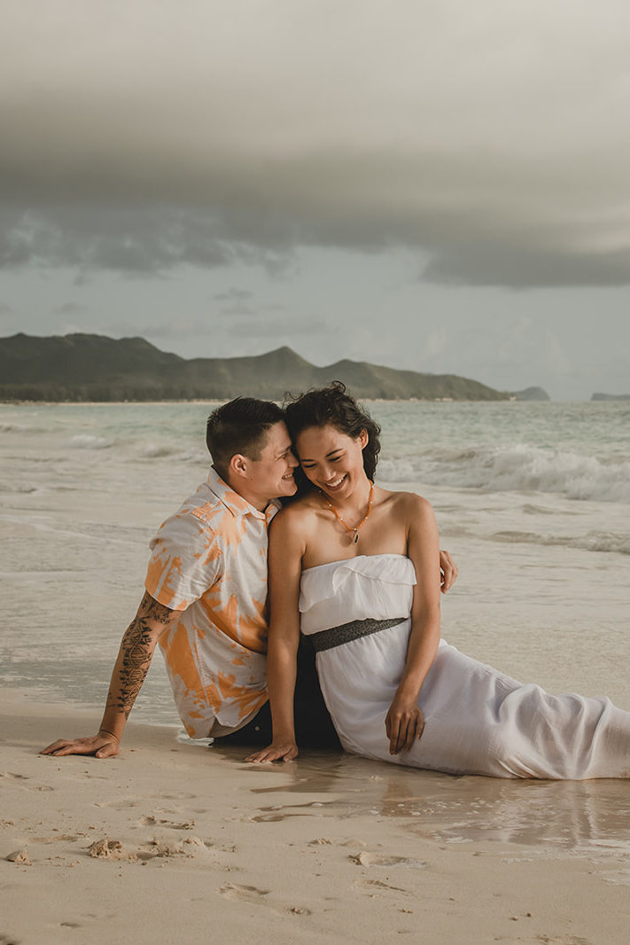 Young engaged couple on a tropical beach