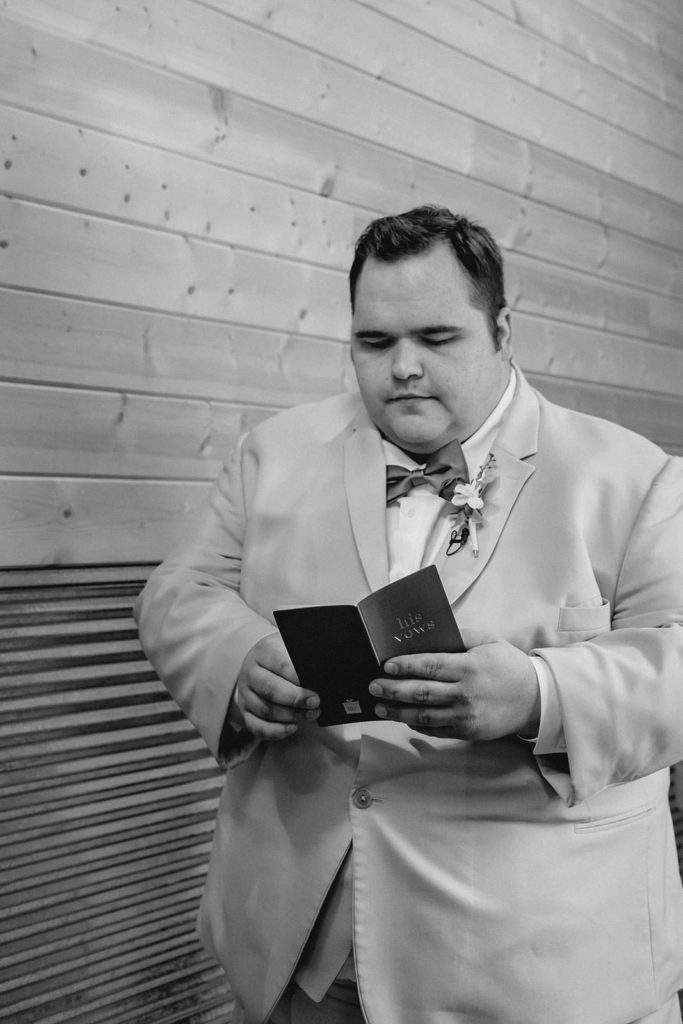 Groom practicing vows before wedding ceremony