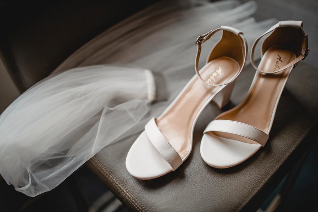 Bridal shoes and veil detail shot