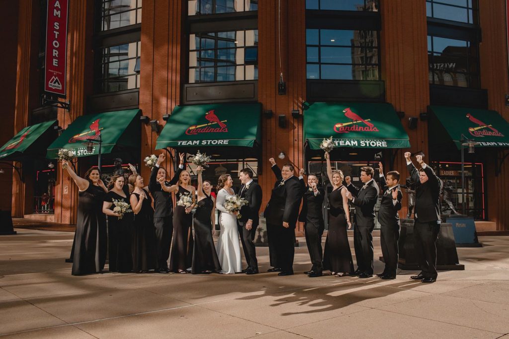 St. Louis Cardinal wedding party at busch stadium celebrating
