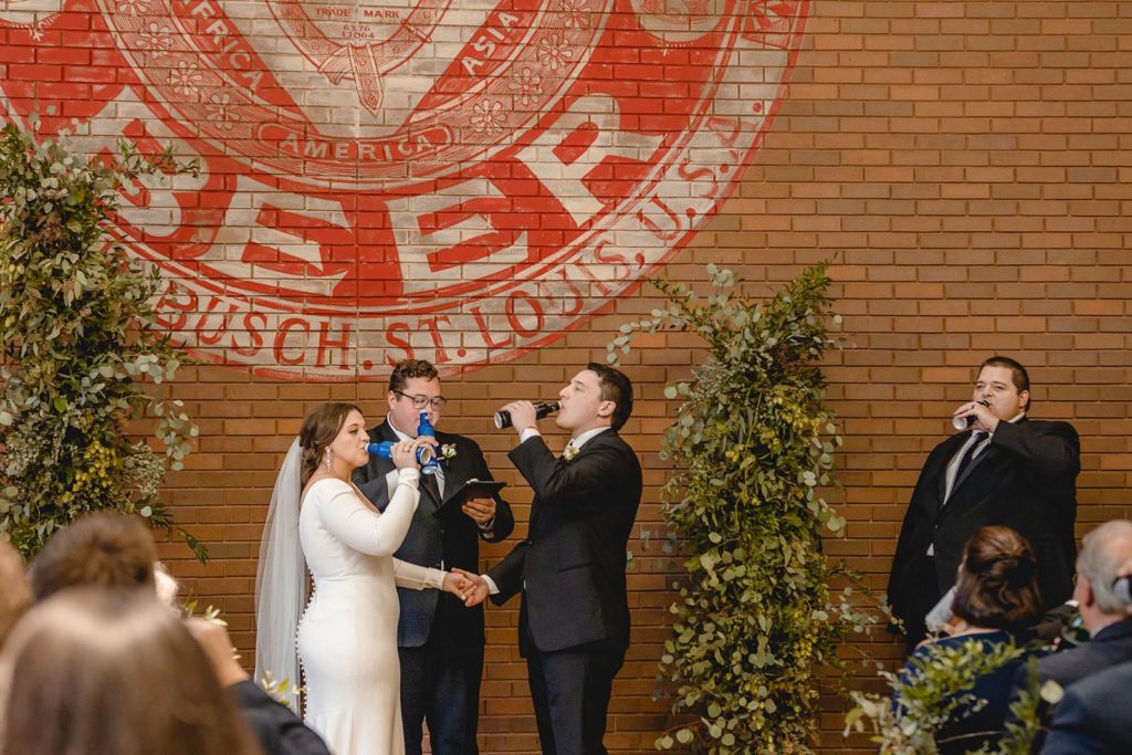 Guest toasting at Anheuser Busch Brewery Wedding