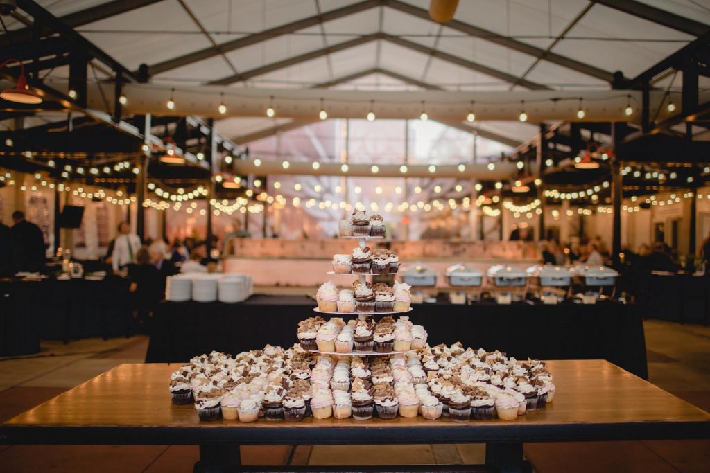 Desert table full of cupcakes at Anheuser Busch wedding venue