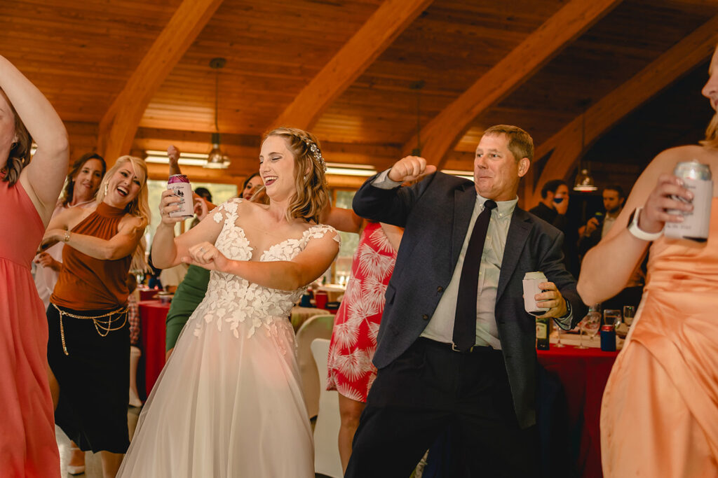 bride dancing with her father to the wobble